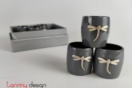 Set of 6 grey napkin rings attached with dragonfly